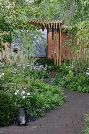 o jardim do rouxinol de florença uma celebração da enfermagem moderna projetada por robert myers patrocinado pela confiança burdett para a mostra de enfermagem jardim rhs chelsea flower show 2021 estande no 322