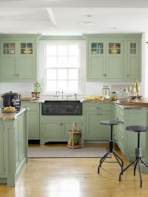 cozinha de bacalhau com armários verdes